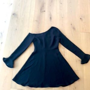 Black, fit and flair, cut on bias shoulder.
